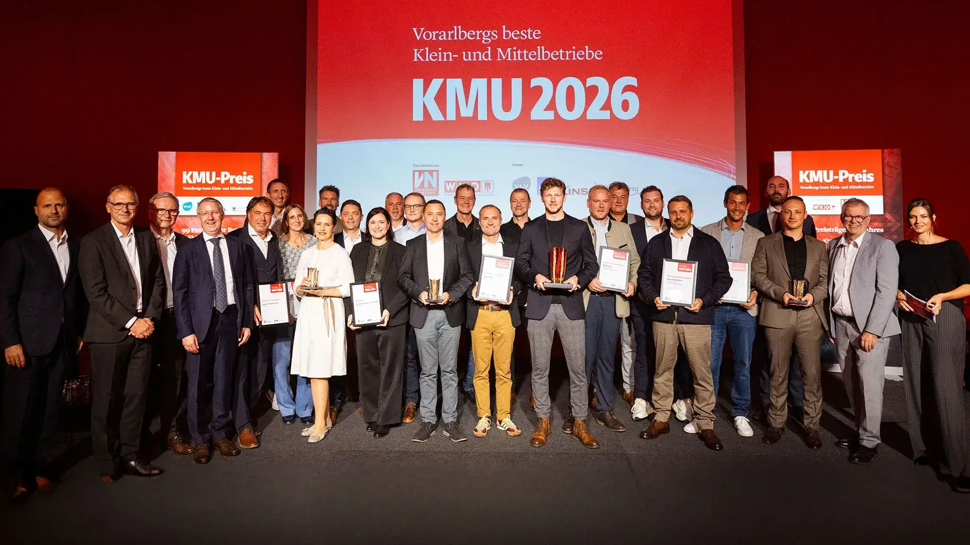 nesevo and other award recipients on stage at the VN KMU-Preis 2026 in Vorarlberg